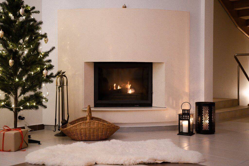 frameless fireplace surrounded by stone
